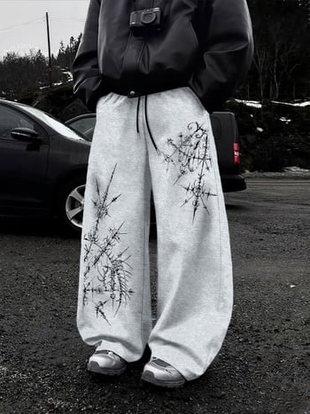 Pantaloni cu imprimeu abstract cu țepi, stil West Coast, talie cu șnur, croială largă