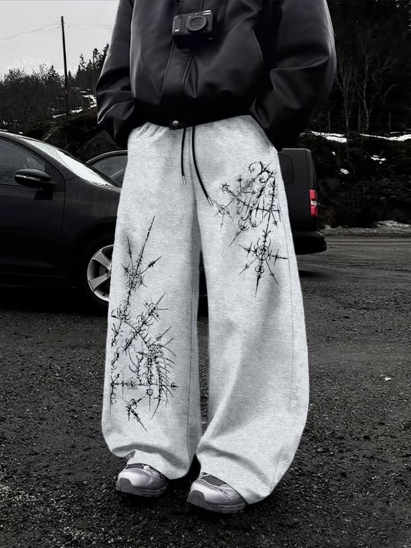 Pantaloni cu imprimeu abstract cu țepi, stil West Coast, talie cu șnur, croială largă