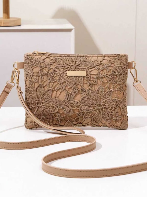 Ženski PU kožni clutch s prorezanim cvjetovima, mali kvadratni oblik, svakodnevni stil, lagani luksuz, jesen 2025