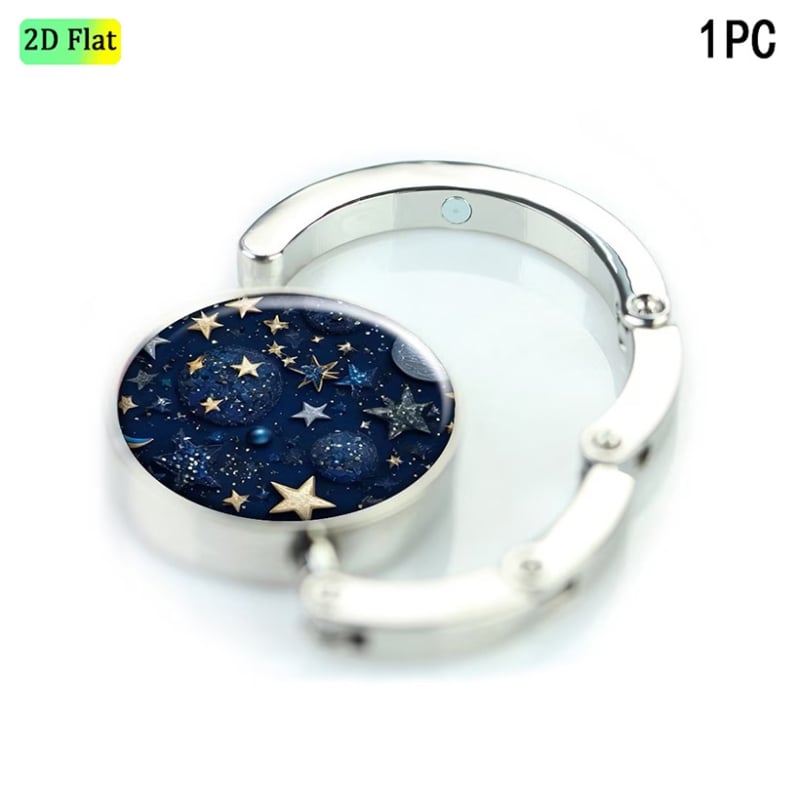 Cuier pliabil cu design galaxie și stele, bază antiderapantă, stabil și portabil, suportă până la 10-15 kg.