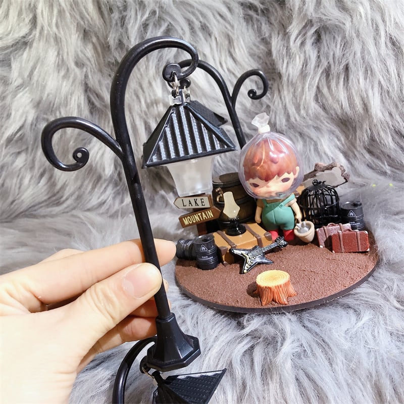 DIY set smole: osvijetljena ulična lampica kao dekorativna figurica, krem ljepilo i dodaci za izradu vlastitog kućišta za mobitel