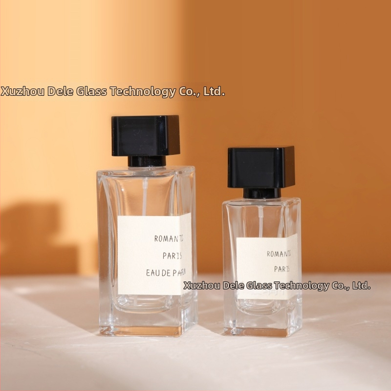 Sticluță de parfum din sticlă pătrată 50 ml/100 ml cu pulverizator, dop bayonet, pentru ambalarea parfumurilor și uleiurilor esențiale