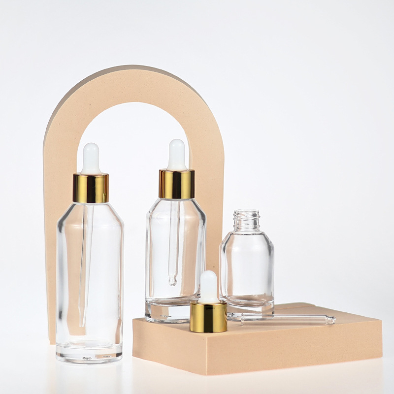 Sticluță din sticlă transparentă cu pipetă pentru esență cosmetică, design cu umăr înclinat, capacitate 30/50/100 ml