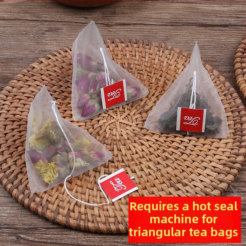 Pungi de ceai triunghiulare din nylon, de calitate alimentară, cu plasă filtrantă și sigilare termică.