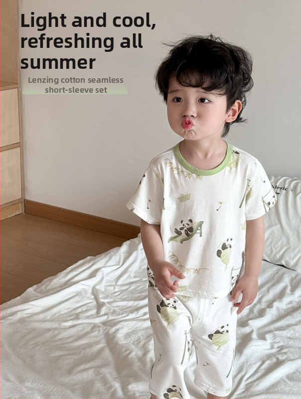 Set de vară pentru copii din două piese: tricou cu mânecă scurtă și pantaloni scurți din modal Lenzing, respirabil, unisex.