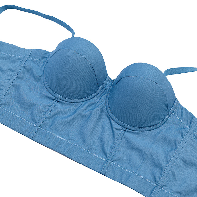 Maiou sexy cu oase de pește, cu cupe căptușite și arc de oțel pentru modelarea bustului, destinat să fie purtat ca piesă exterioară.