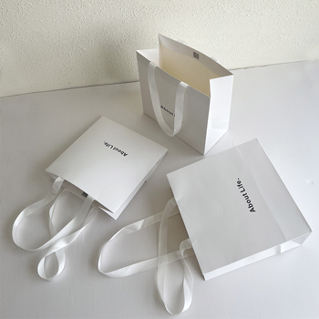 Geantă de cumpărături din carton alb cu mânere, pungă cadou minimalistă pentru magazine de îmbrăcăminte
