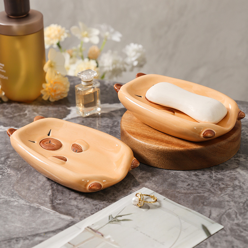Săpunieră ceramică Capibara cu drenaj pentru baie