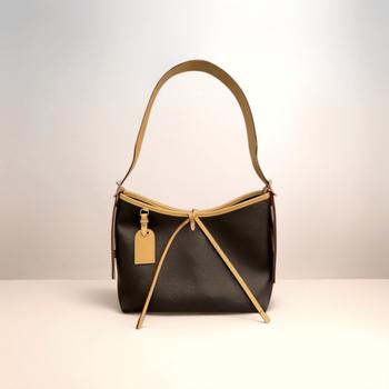 Geantă tote din piele naturală cu monogram, însoțită de un plic asortat, versatilă pentru mână, umăr sau crossbody.