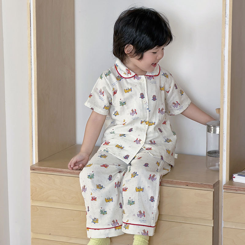 Pijamale pentru copii din bumbac 100% – țesătură din tifon pentru primăvară-vară, mâneci scurte, pantaloni lungi, unisex, imprimeu cu desene animate, set din două piese