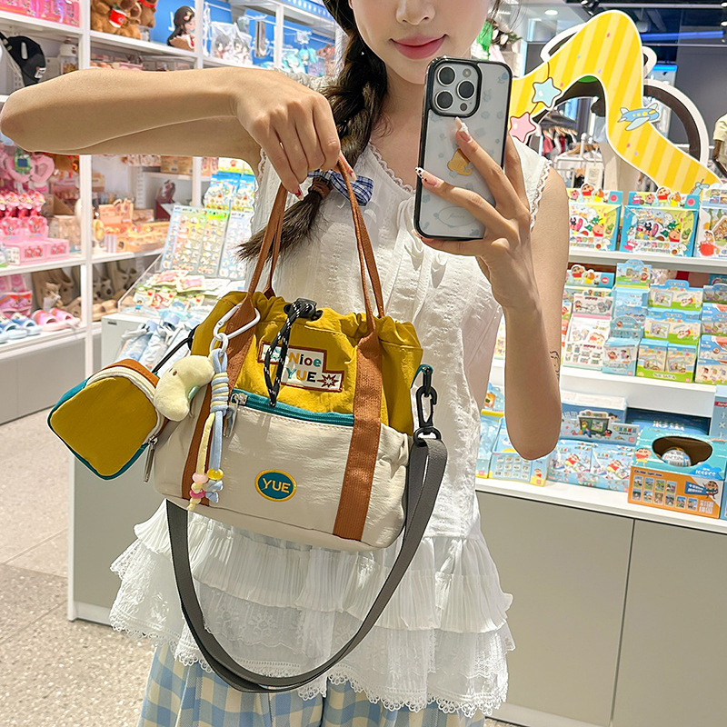 Geantă crossbody pentru femei, stil coreean 2025, bucket color-block, capacitate mare, pentru studente