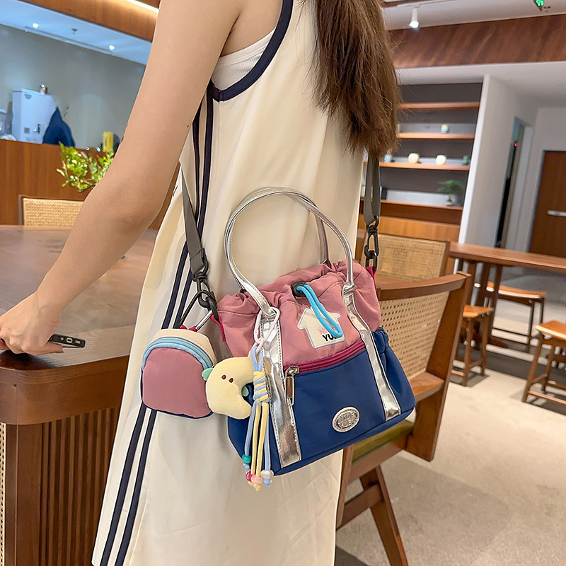 Geantă crossbody pentru femei, stil coreean 2025, bucket color-block, capacitate mare, pentru studente