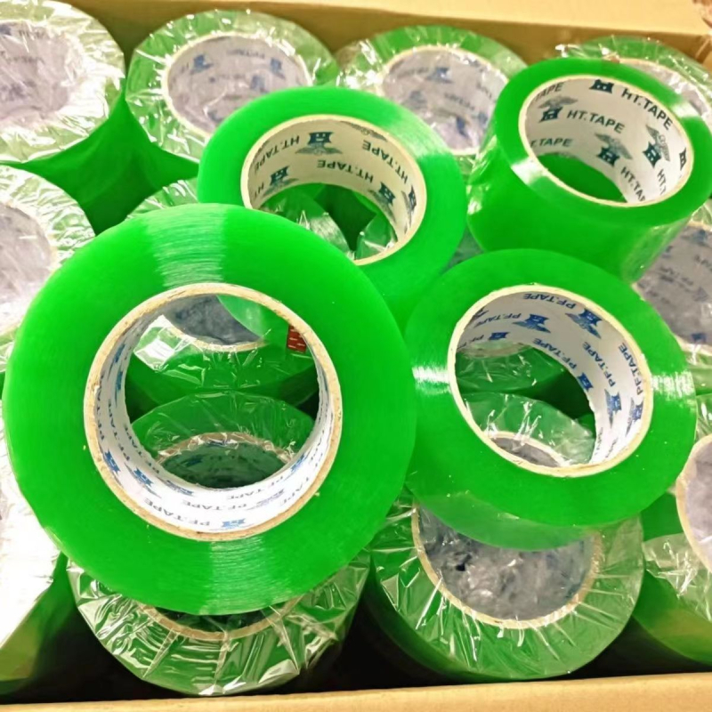 Bandă de ambalare transparentă verde, rolă mare, lățime 5,5 cm, pentru sigilare și ambalare.