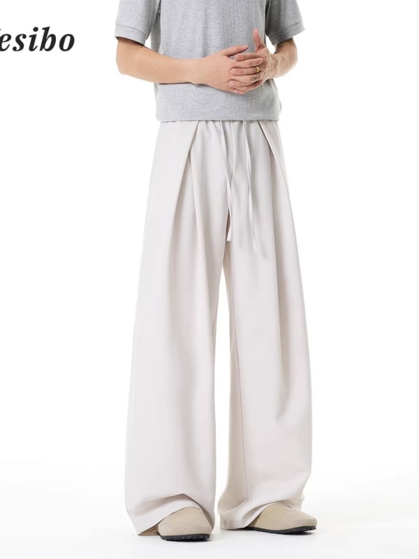 Pantaloni casual subțiri, uni, de vară, cu pliuri și șiret în talie, croială dreaptă spre largă, lungi