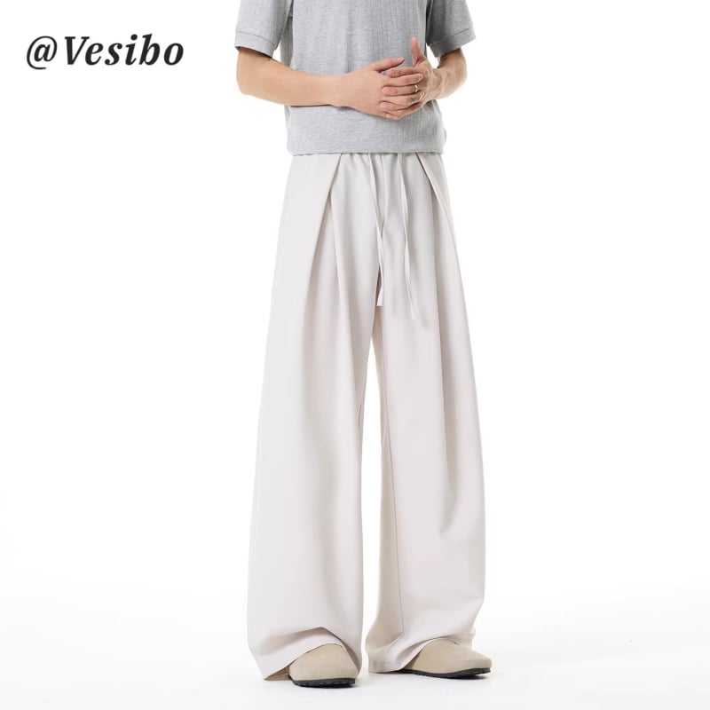 Pantaloni casual subțiri, uni, de vară, cu pliuri și șiret în talie, croială dreaptă spre largă, lungi