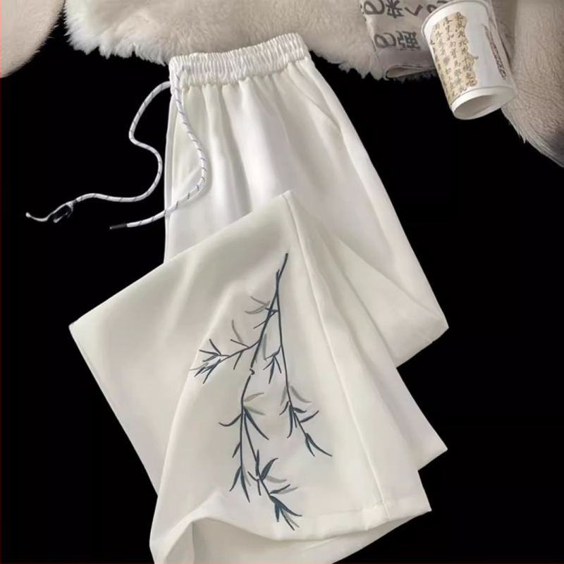 Pánske letné nohavice z ľadového hodvábu, vysoko elastické, ľahké, voľného strihu, ležérne s výšivkou