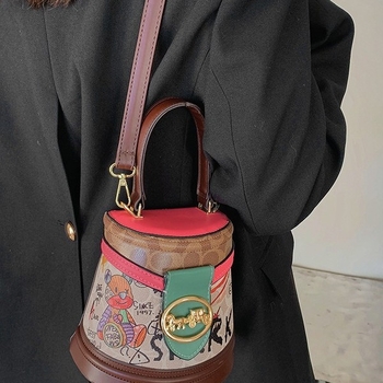 Geantă bucket 2024 nouă, design cu urs de desene animate, model graffiti, formă cilindrică, geantă de umăr premium