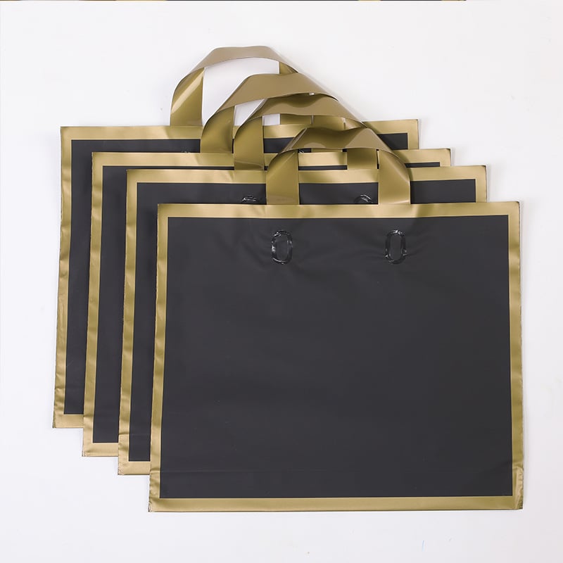 Geantă din plastic mat cu margine aurie pentru haine și încălțăminte