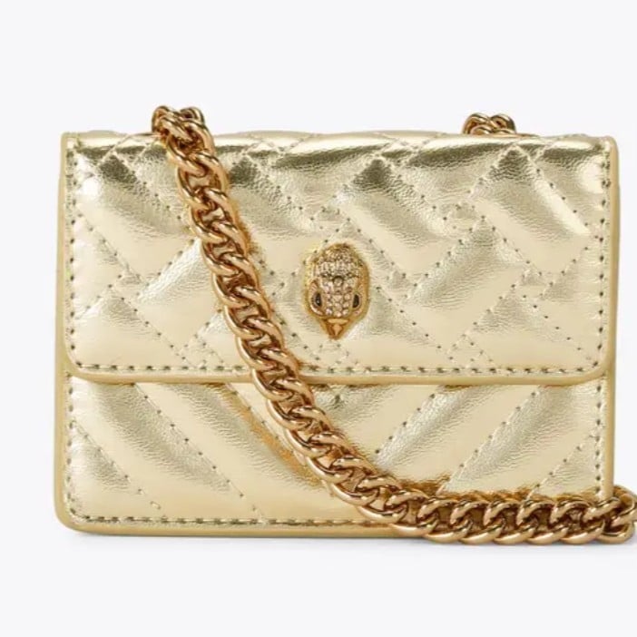 Geantă mini crossbody cu motiv cap de vultur, quilt diamant în culori contrastante, curea din lanț, buzunar pentru ruj și carduri.