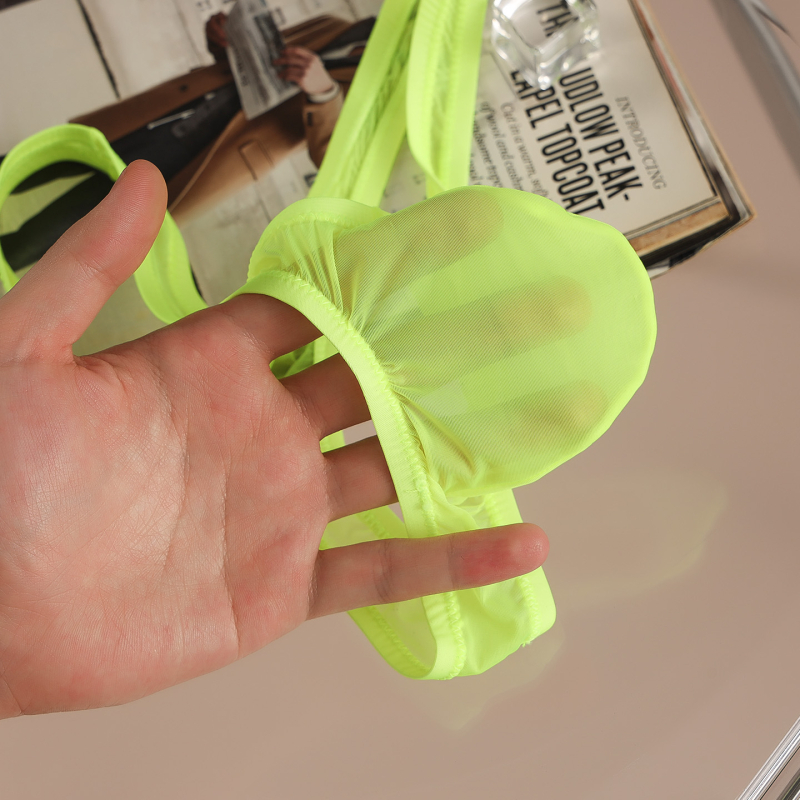50 g thong transparent din Ice Silk pentru bărbați, talie foarte joasă, design transparent