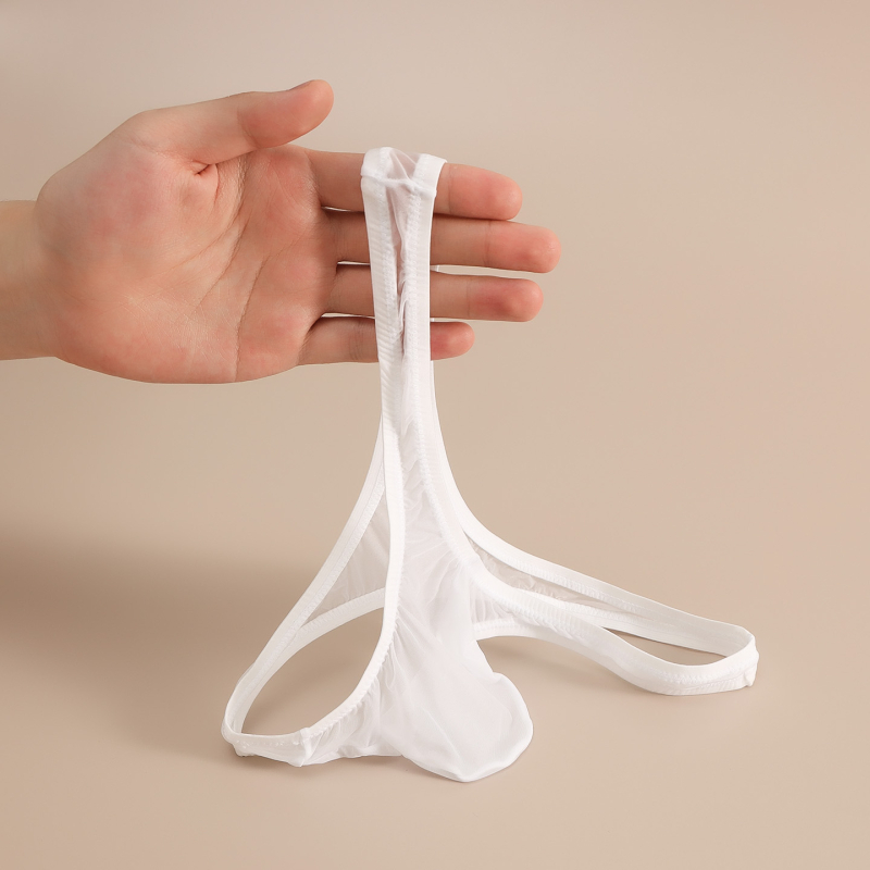 50 g thong transparent din Ice Silk pentru bărbați, talie foarte joasă, design transparent