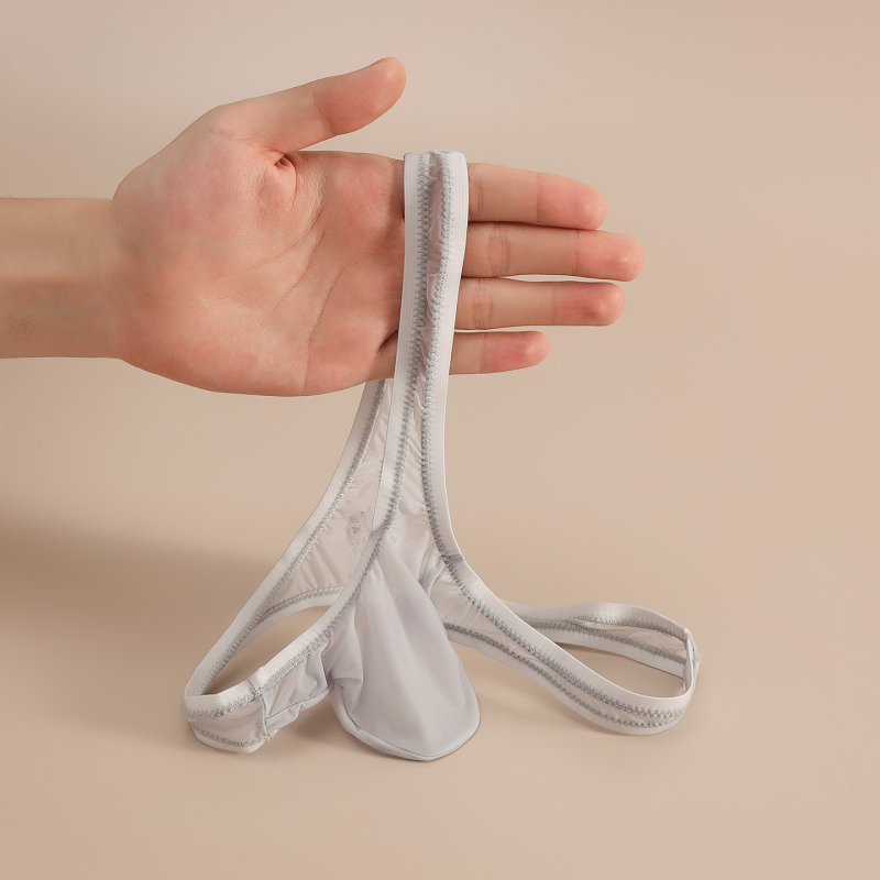 50 g thong transparent din Ice Silk pentru bărbați, talie foarte joasă, design transparent