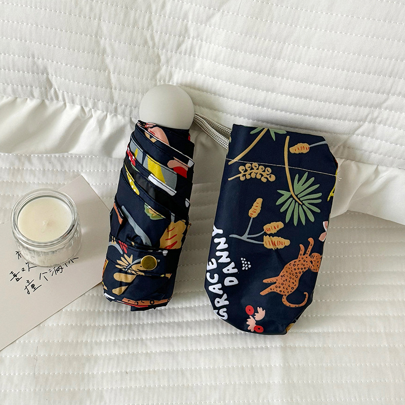 Umbrelă automată pliabilă cu trei secțiuni, imprimeu floral bleumarin, design compact tip capsulă de buzunar, protecție UV UPF50+
