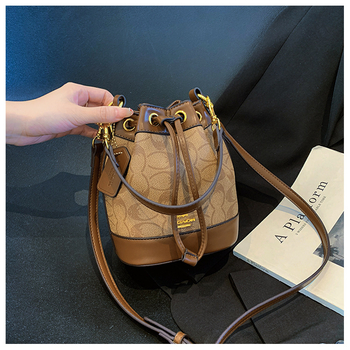 Geantă bucket pentru femei din PU, imprimeu, mică, model nou 2025, crossbody cu șnur, textură premium