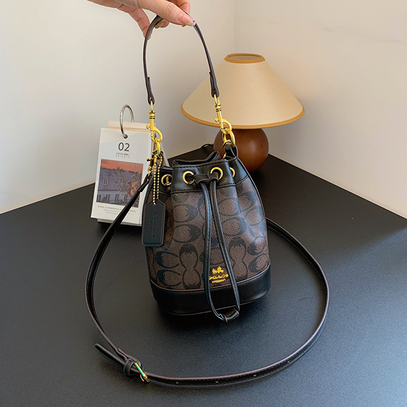 Geantă bucket pentru femei din PU, imprimeu, mică, model nou 2025, crossbody cu șnur, textură premium