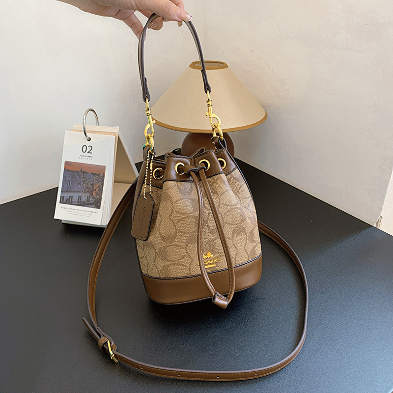 Geantă bucket pentru femei din PU, imprimeu, mică, model nou 2025, crossbody cu șnur, textură premium