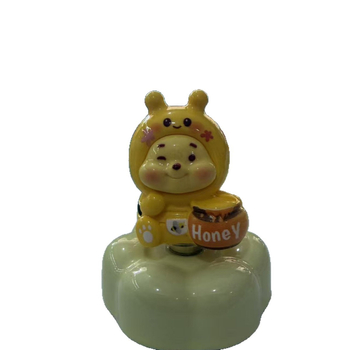 Ornament ceramic rotativ pentru birou, cu personaje de desene animate