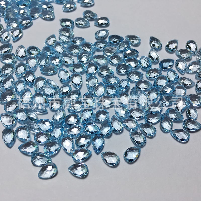 Topaz albastru ceresc în formă de lacrimă, 4x6 mm, fațete pătrate duble și tăietură dublă cu aspect țestoasă