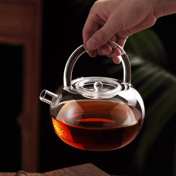 Ceainic din sticlă borosilicată cu mâner, design floral, rezistent la căldură, stil modern minimalist