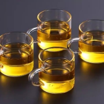 Ceainic din sticlă borosilicată cu mâner, design floral, rezistent la căldură, stil modern minimalist