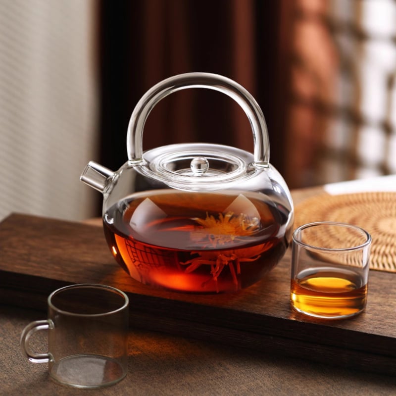 Ceainic din sticlă borosilicată cu mâner, design floral, rezistent la căldură, stil modern minimalist