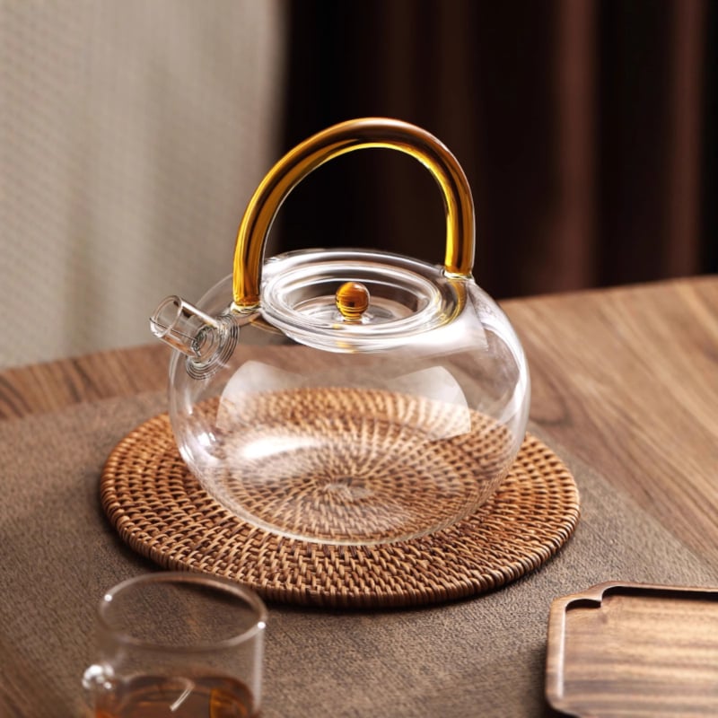 Ceainic din sticlă borosilicată cu mâner, design floral, rezistent la căldură, stil modern minimalist