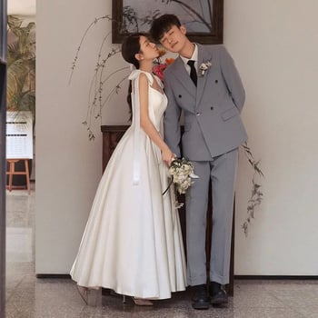 Rochie de mireasă în stil francez, satin ușor, bretele subțiri cu fundă, fără mâneci, lungă în croială A, model nou 2026, pentru logodnă și ceremonie civilă