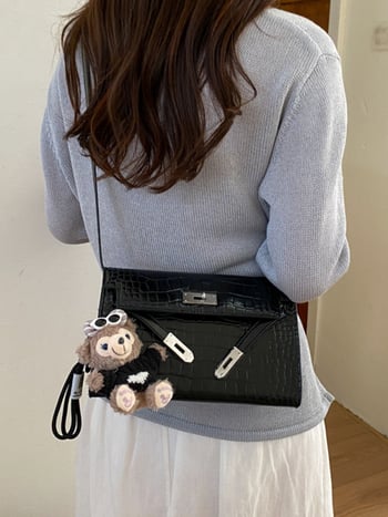 Geantă de damă în primăvara 2026, stil urban minimalist, PU, crossbody cu clapă, formă pătrată mică, dimensiune medie