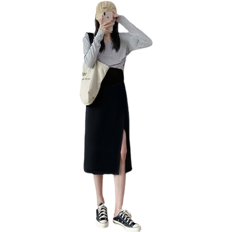 Fustă de costum pentru gravide – neagră, despicătură, croială A, cădere lejeră, lungime midi, vară