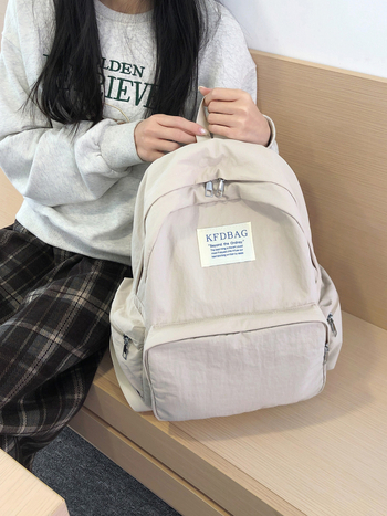 Korejski stil Harajuku ruksak, jednostavnog jednobojnog dizajna, velik kapacitet, lagan i svestran za učenike srednjih i visokih škola te studente; kompatibilan s 14-inčnim laptopom, vodootporan najlon.