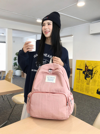 Korejski stil Harajuku ruksak, jednostavnog jednobojnog dizajna, velik kapacitet, lagan i svestran za učenike srednjih i visokih škola te studente; kompatibilan s 14-inčnim laptopom, vodootporan najlon.