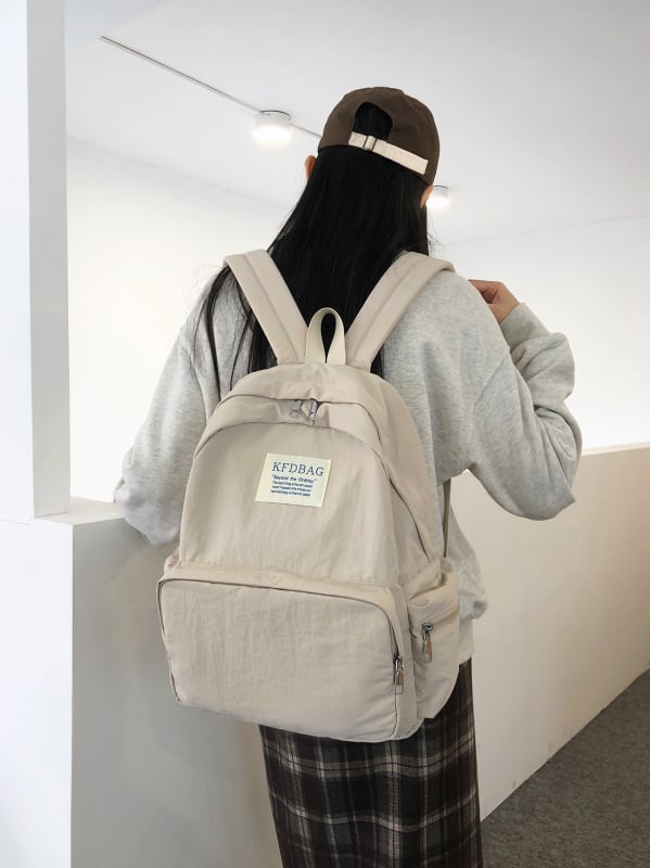 Korejski stil Harajuku ruksak, jednostavnog jednobojnog dizajna, velik kapacitet, lagan i svestran za učenike srednjih i visokih škola te studente; kompatibilan s 14-inčnim laptopom, vodootporan najlon.