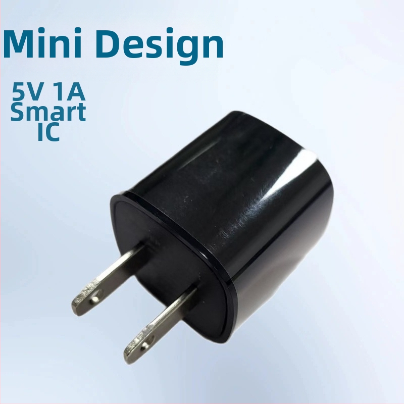 5V1A USB nabíjačka s inteligentným integrovaným obvodom, štandard pre USA, jeden port pre mobilné telefóny, tablety, cestovné a domáce spotrebiče.