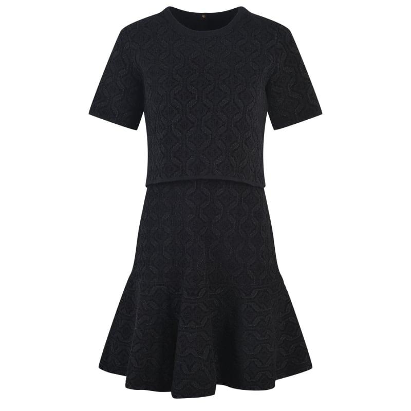 Set din două piese: top cu mânecă scurtă și guler rotund, în imprimeu retro, și fustă în stil fishtail cu margine în formă de frunză de lotus