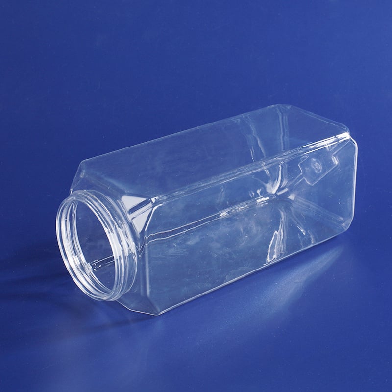 Recipient din plastic transparent pentru alimente: nuci, cereale, gustări și miere; sigilat; ambalaj PET universal