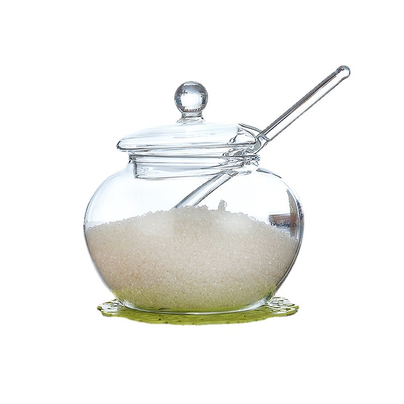 Recipient din sticlă borosilicat înalt, cu linguriță și capac, pentru ceai, cafea, zahăr și condimente