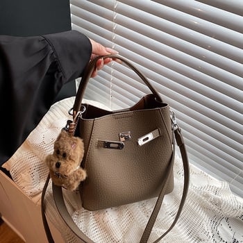 Geantă bucket pentru femei, crossbody, din PU, textură lychee, mărime medie, închidere magnetică, buzunar interior cu fermoar, utilizare zilnică, primăvara 2026.