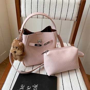 Geantă bucket pentru femei, crossbody, din PU, textură lychee, mărime medie, închidere magnetică, buzunar interior cu fermoar, utilizare zilnică, primăvara 2026.
