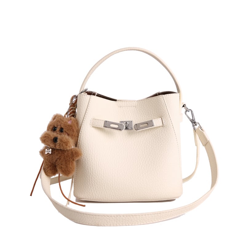 Geantă bucket pentru femei, crossbody, din PU, textură lychee, mărime medie, închidere magnetică, buzunar interior cu fermoar, utilizare zilnică, primăvara 2026.