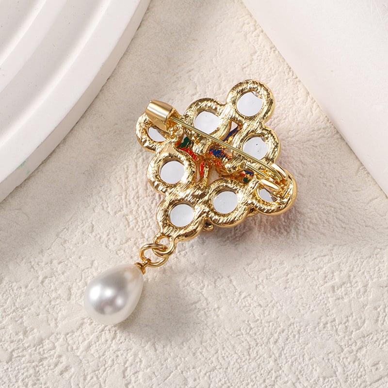 Broșă cu nod colorat pentru femei – accesoriu elegant pentru sacou